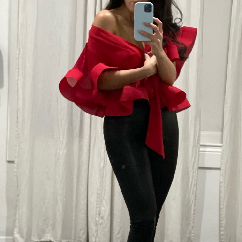 Structured plunging neck peplum red blouse